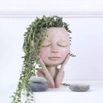 עציץ בצורת פני אישה